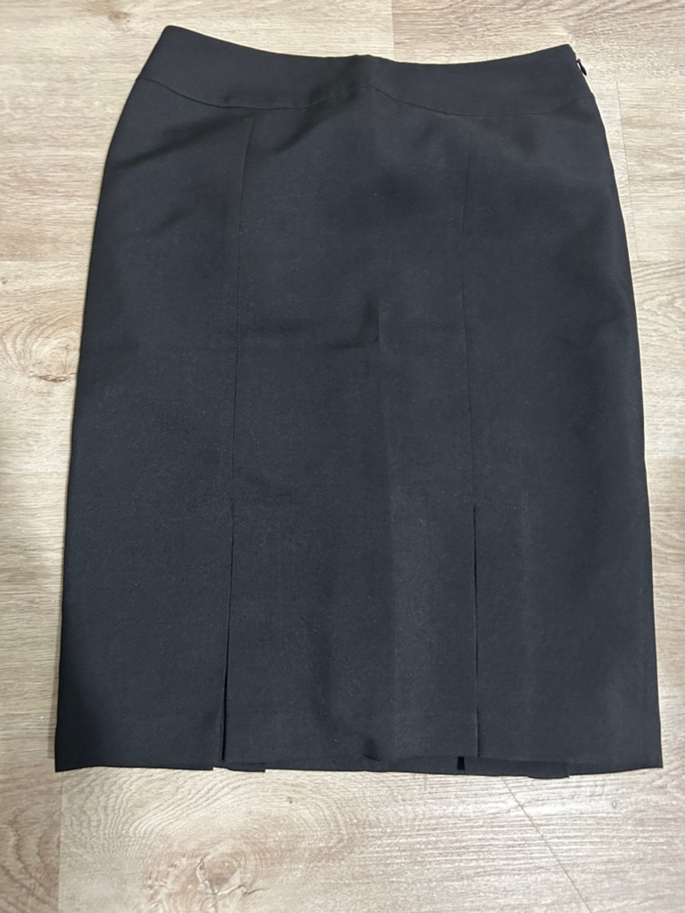 Mid-length straight black skirt